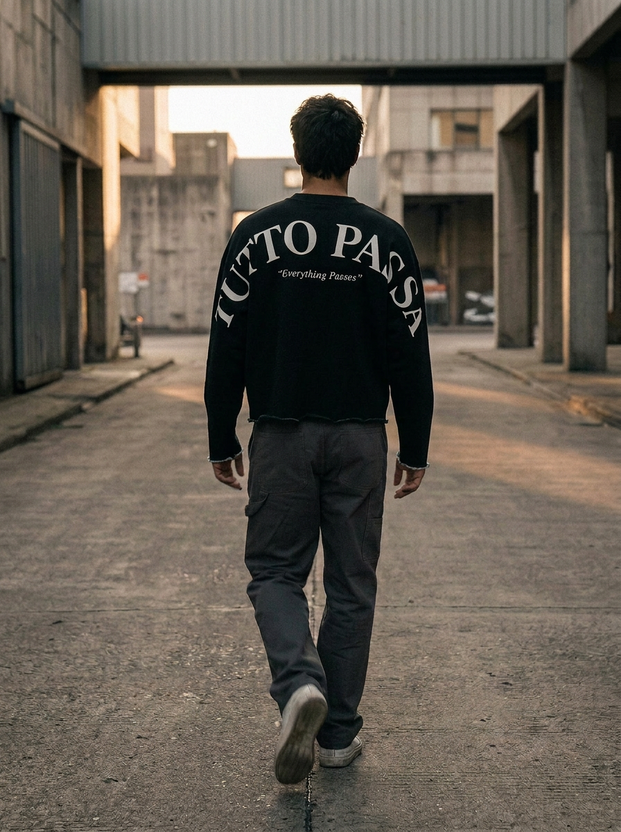 Figure walking through an industrial corridor in PASSO long sleeve